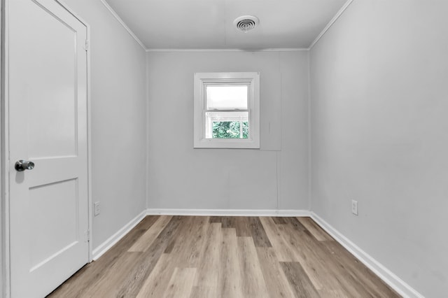 849 Restbrook Ave, Memphis, TN 38127 - unfurnished room with wood finished floors and ornamental molding