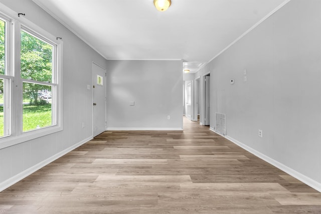 849 Restbrook Ave, Memphis, TN 38127 - empty room featuring healthy amount of natural light, ornamental molding, and light wood finished floors