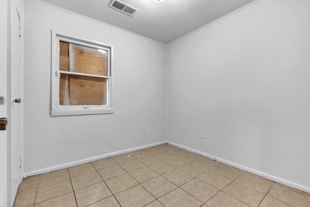 3594 Sunrise St, Memphis, TN 38127 - spare room featuring ornamental molding and light tile patterned floors