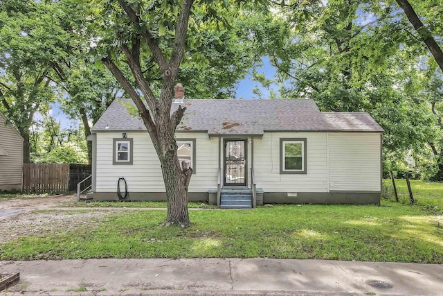 603 Burlington Cir, Memphis, TN 38127 - bungalow-style house with a chimney and roof with shingles