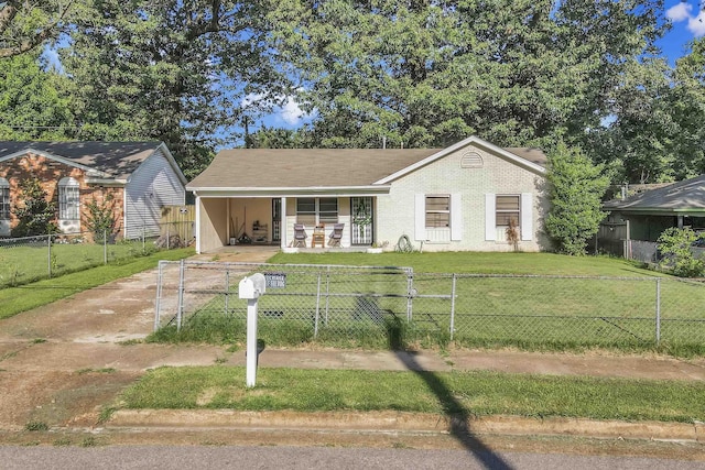 3255 Benjestown Rd, Memphis, TN 38127 - view of front of house with covered porch, a fenced front yard, an attached carport, and concrete driveway