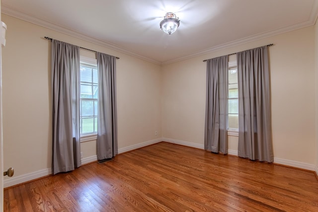 117 N High St, Waynesboro, TN 38485 - unfurnished room with light wood finished floors and ornamental molding