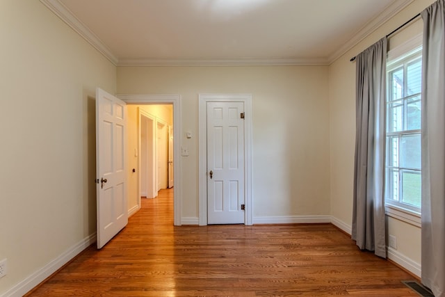 117 N High St, Waynesboro, TN 38485 - unfurnished room featuring ornamental molding and wood finished floors
