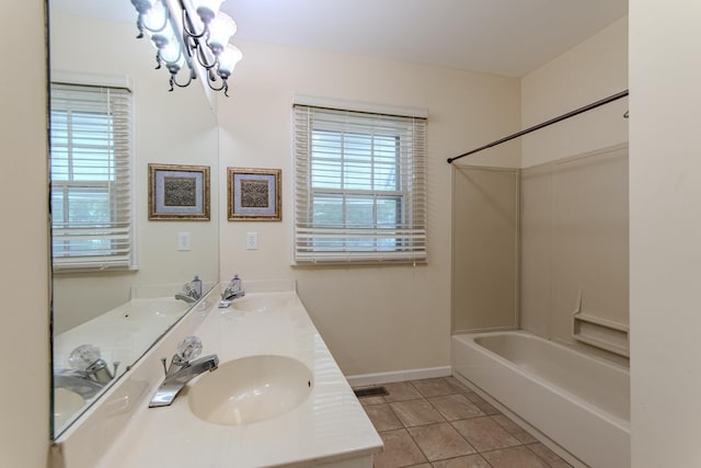 117 N High St, Waynesboro, TN 38485 - bathroom with shower / washtub combination, double vanity, a chandelier, and tile patterned flooring