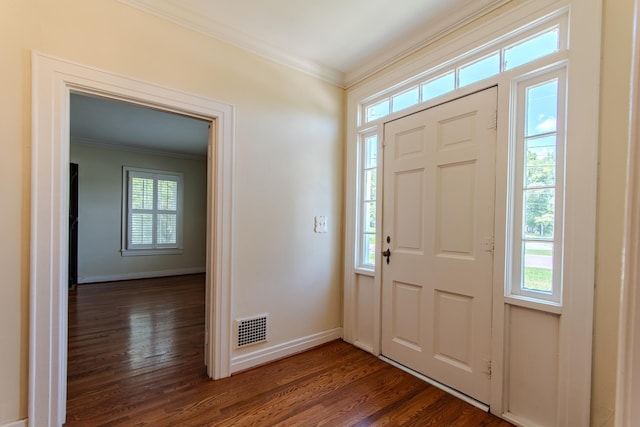 117 N High St, Waynesboro, TN 38485 - foyer with crown molding, plenty of natural light, and dark wood finished floors