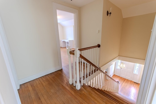 117 N High St, Waynesboro, TN 38485 - staircase featuring wood-type flooring and lofted ceiling