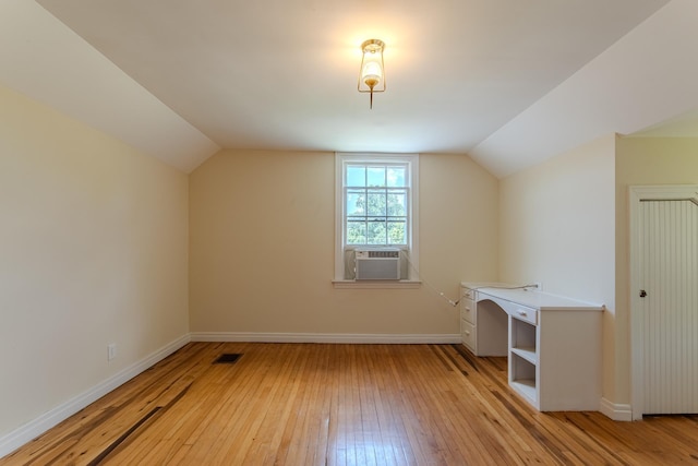 117 N High St, Waynesboro, TN 38485 - bonus room featuring cooling unit, light wood-style flooring, and lofted ceiling