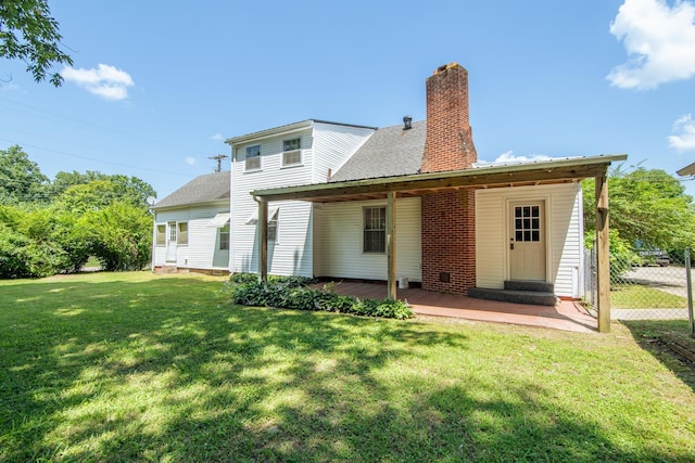 117 N High St, Waynesboro, TN 38485 - back of house with a chimney
