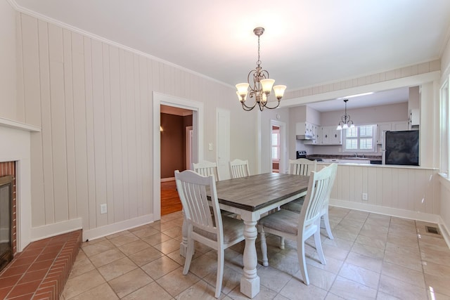 117 N High St, Waynesboro, TN 38485 - dining space featuring a chandelier and ornamental molding