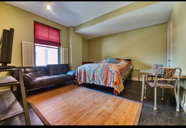 109 N Main St Unit 603, Memphis, TN 38103 - bedroom with concrete flooring