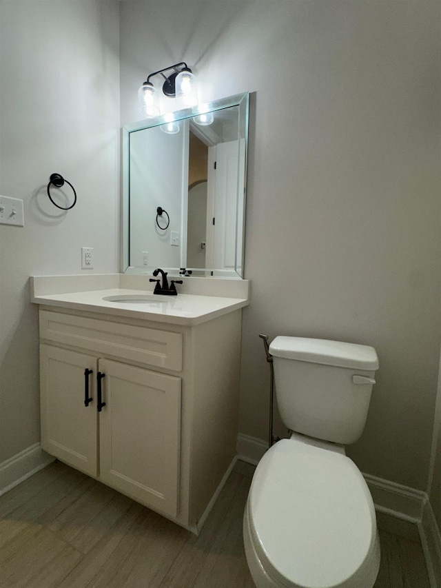 7412 Lost Trail Dr, Cordova, TN 38016 - half bath featuring vanity and wood finished floors