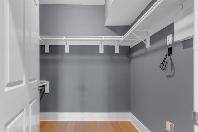 621 Denmark Dr Unit 201, Memphis, TN 38103 - walk in closet with wood finished floors