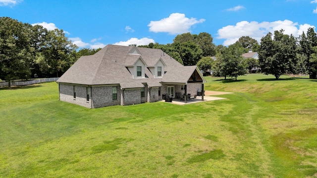 620 N Reid-Hooker Rd, Eads, TN 38028 - rear view of property featuring a patio area, brick siding, and a shingled roof