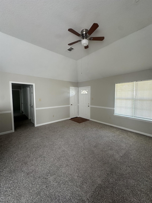 7029 Petten Cv, Memphis, TN 38133 - spare room featuring ceiling fan, dark colored carpet, and lofted ceiling