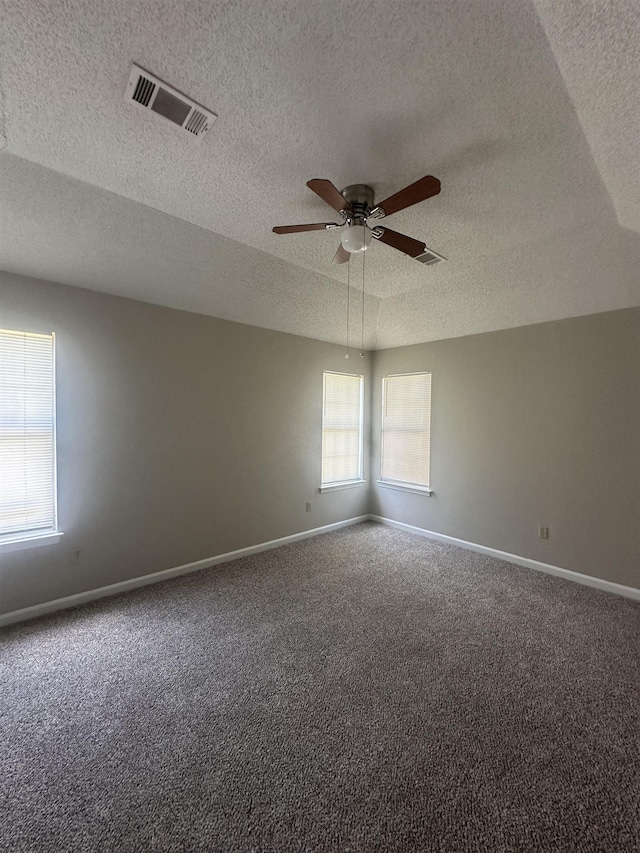 7029 Petten Cv, Memphis, TN 38133 - empty room with a textured ceiling, carpet flooring, and ceiling fan