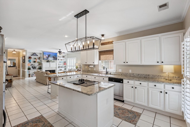 927 Oakmont Ridge Cv, Collierville, TN 38017 - kitchen with stainless steel dishwasher, black electric stovetop, ceiling fan, light tile patterned flooring, and white cabinets