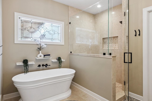 927 Oakmont Ridge Cv, Collierville, TN 38017 - full bath with a freestanding tub, a shower stall, and recessed lighting
