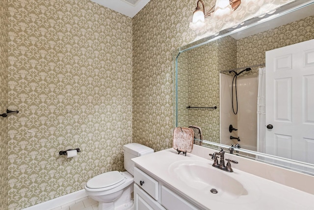 927 Oakmont Ridge Cv, Collierville, TN 38017 - bathroom with vanity, tile patterned flooring, and wallpapered walls