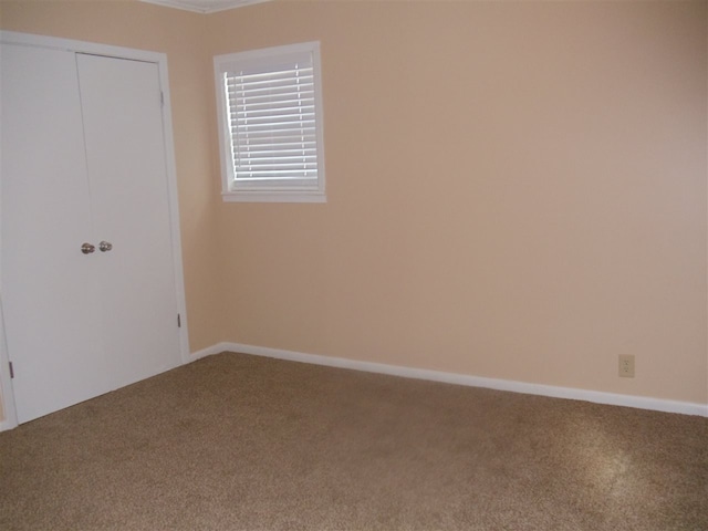 273 Main St, Ripley, TN 38063 - unfurnished bedroom featuring carpet flooring and a closet