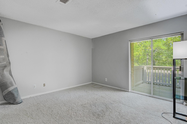 4764 Eagle Crest Dr Unit 4002, Memphis, TN 38117 - empty room featuring carpet flooring and a textured ceiling