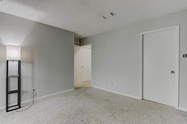 4764 Eagle Crest Dr Unit 4002, Memphis, TN 38117 - unfurnished bedroom with carpet floors and a textured ceiling