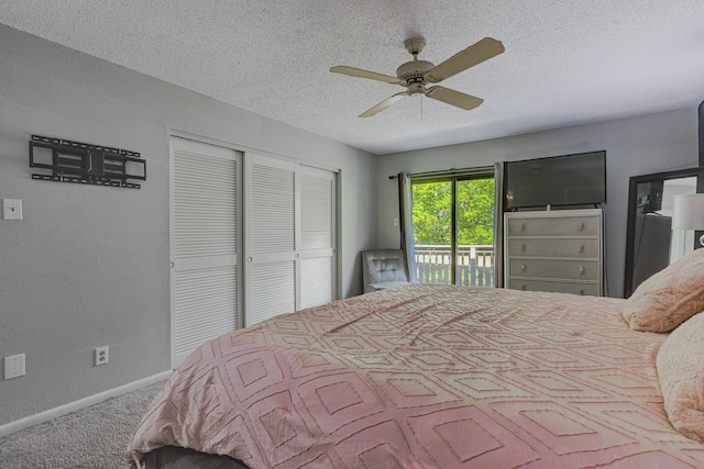 4764 Eagle Crest Dr Unit 4002, Memphis, TN 38117 - carpeted bedroom featuring access to outside, a closet, a textured ceiling, and ceiling fan