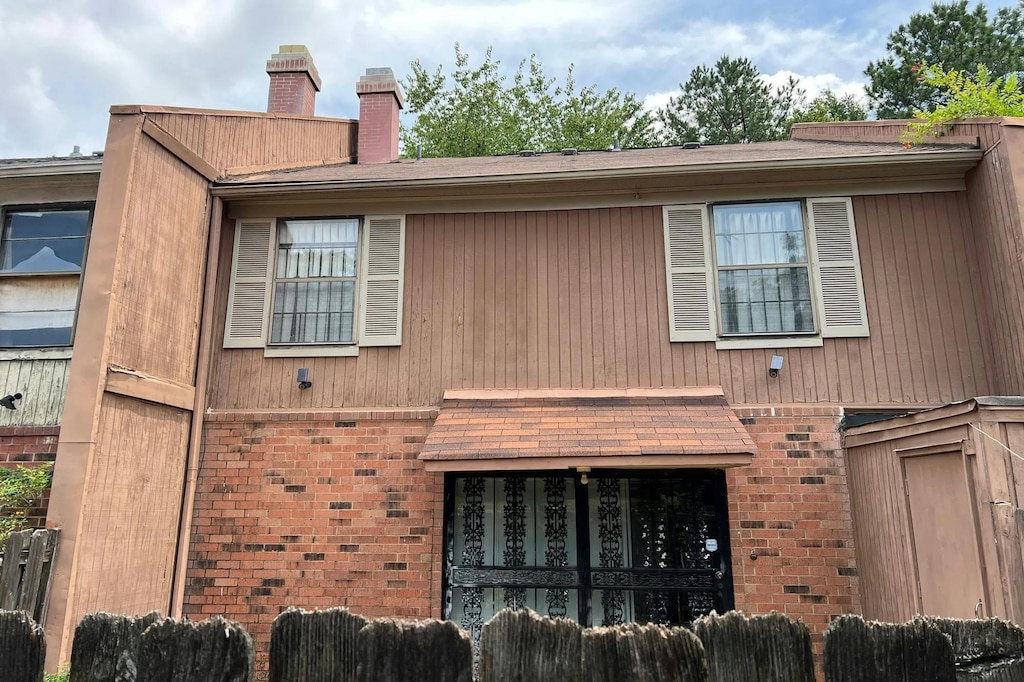 4891 Southworth Ct Unit 51, Memphis, TN 38118 - view of front of home featuring brick siding and a chimney