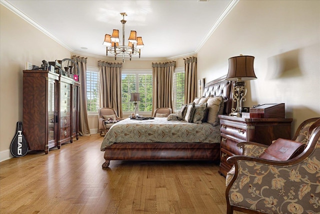 269 N Monterey Farms Cv, Collierville, TN 38017 - bedroom featuring wood finished floors, a chandelier, and ornamental molding