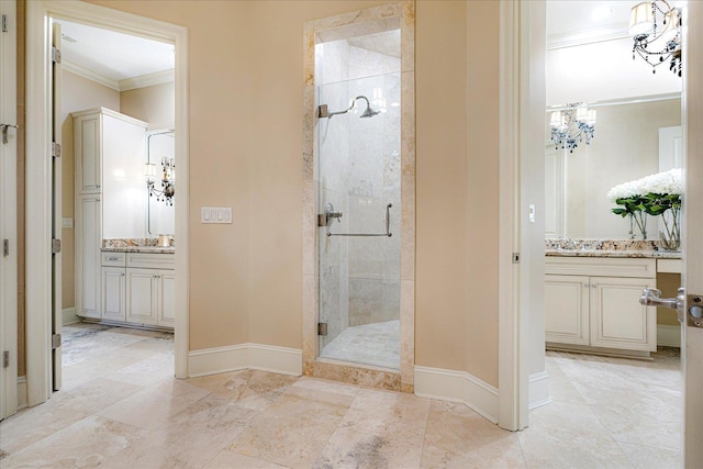 269 N Monterey Farms Cv, Collierville, TN 38017 - full bath with ornamental molding, a shower stall, vanity, and a chandelier