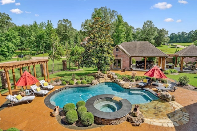 269 N Monterey Farms Cv, Collierville, TN 38017 - view of swimming pool with a gazebo, a patio area, view of wooded area, a pool with connected hot tub, and an outdoor structure