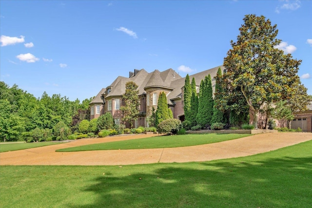 269 N Monterey Farms Cv, Collierville, TN 38017 - view of front facade with a front lawn and brick siding