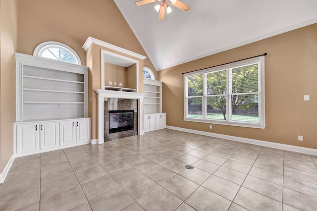 1062 Center Ridge Rd, Collierville, TN 38017 - unfurnished living room featuring tile patterned floors, ceiling fan, a fireplace, high vaulted ceiling, and built in shelves