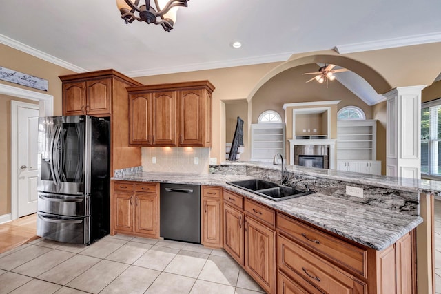 1062 Center Ridge Rd, Collierville, TN 38017 - kitchen with stainless steel refrigerator with ice dispenser, dishwashing machine, a peninsula, arched walkways, and crown molding