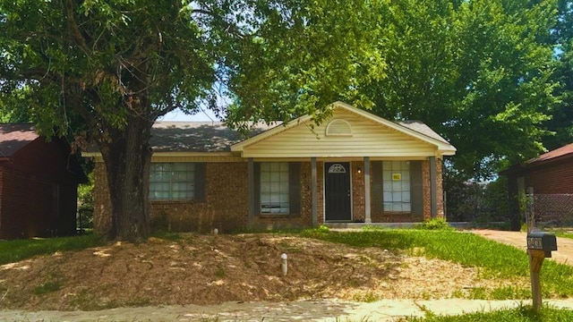 3430 Dobbin Ferry Ave, Memphis, TN 38118 - view of front facade with brick siding and a porch