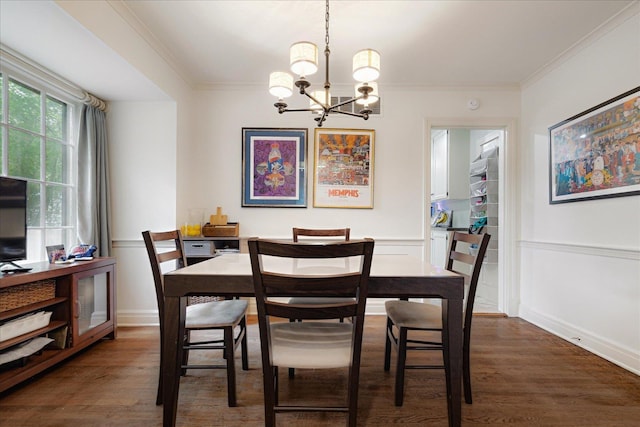 149 Palisade St, Memphis, TN 38111 - dining area with a chandelier, dark wood-type flooring, ornamental molding, and wainscoting