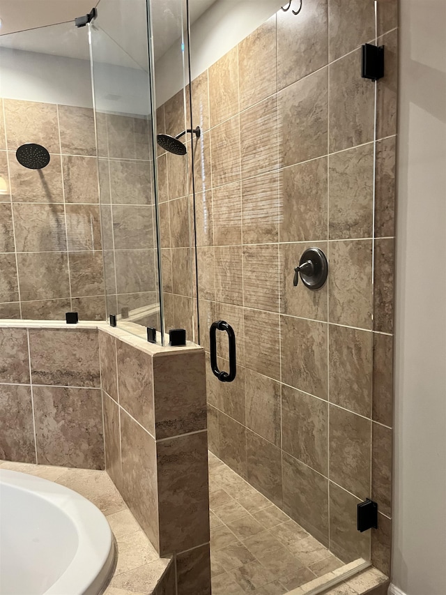 8334 Stonecrest Dr W, Olive Branch, MS 38654 - bathroom with a stall shower and a bath