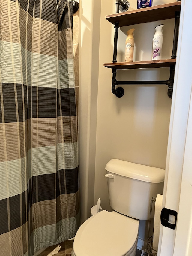 8334 Stonecrest Dr W, Olive Branch, MS 38654 - full bathroom featuring toilet and curtained shower