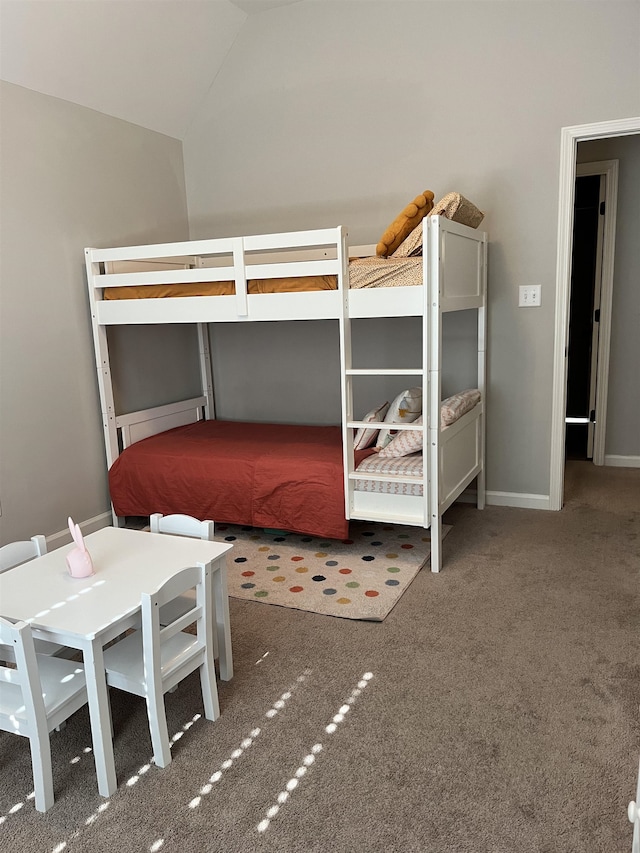 8334 Stonecrest Dr W, Olive Branch, MS 38654 - carpeted bedroom featuring lofted ceiling and baseboards
