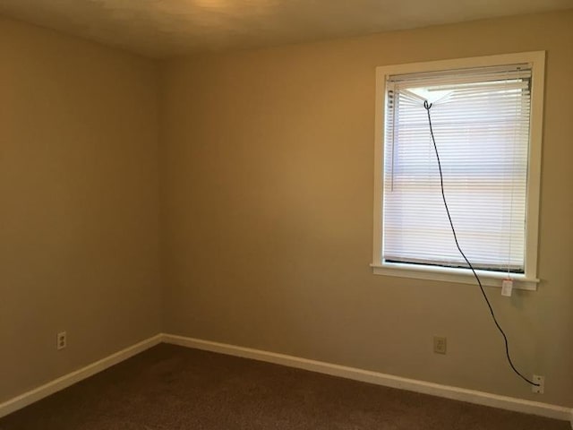3092 Knightway St, Memphis, TN 38118 - unfurnished room featuring dark carpet and healthy amount of natural light