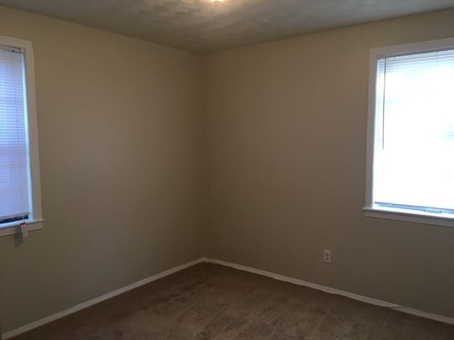 3092 Knightway St, Memphis, TN 38118 - spare room with dark colored carpet