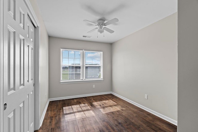 1169 Dovecrest Rd, Memphis, TN 38134 - unfurnished bedroom featuring a closet, dark wood-type flooring, and ceiling fan