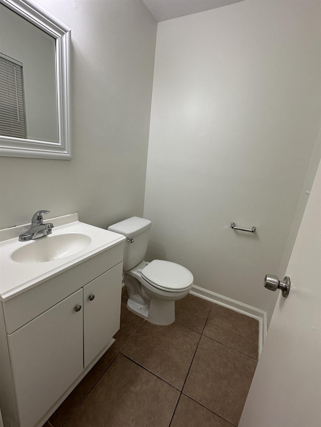1289 Heathcliff Dr, Memphis, TN 38134 - half bath with tile patterned floors and vanity