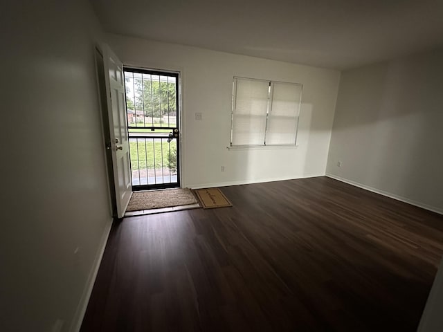 1289 Heathcliff Dr, Memphis, TN 38134 - spare room with dark wood finished floors and baseboards