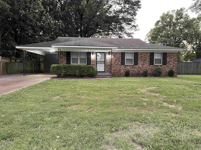 1289 Heathcliff Dr, Memphis, TN 38134 - ranch-style house with concrete driveway, a carport, and brick siding