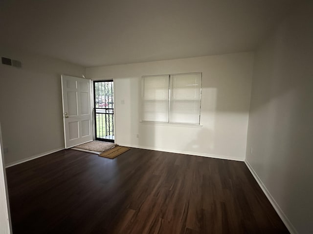 1289 Heathcliff Dr, Memphis, TN 38134 - empty room featuring dark wood-type flooring and baseboards