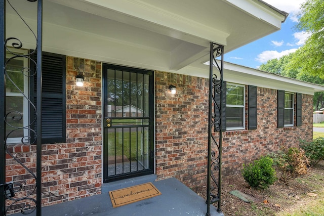 1289 Heathcliff Dr, Memphis, TN 38134 - doorway to property with brick siding and a porch