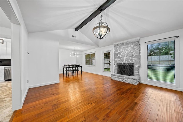 366 Casca Cv, Collierville, TN 38017 - unfurnished living room with a chandelier, hardwood / wood-style floors, and a fireplace