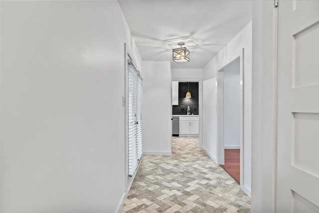 366 Casca Cv, Collierville, TN 38017 - hall with a sink and brick patterned floors