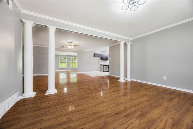 2826 Whitney Ave, Memphis, TN 38127 - unfurnished living room featuring ornamental molding, wood finished floors, ceiling fan, ornate columns, and a textured ceiling