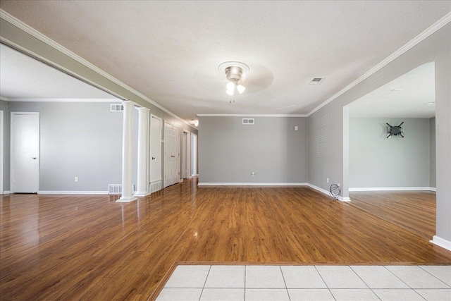 2826 Whitney Ave, Memphis, TN 38127 - spare room with a ceiling fan, light wood-style floors, and crown molding